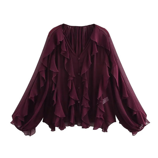 Blusa ligera con volantes manga larga