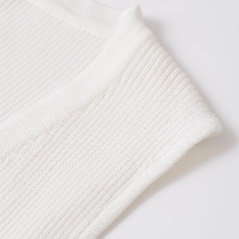 Top estilo chaleco blanco con botones