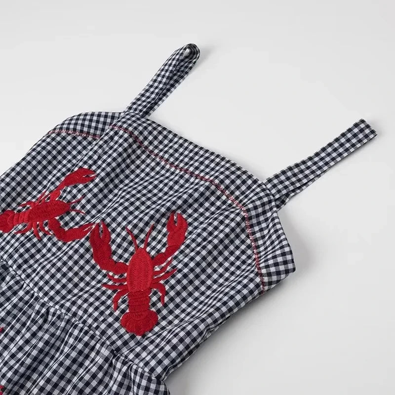 Vestido largo a cuadros con diseño bordado sin mangas