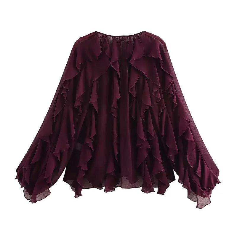 Blusa ligera con volantes manga larga