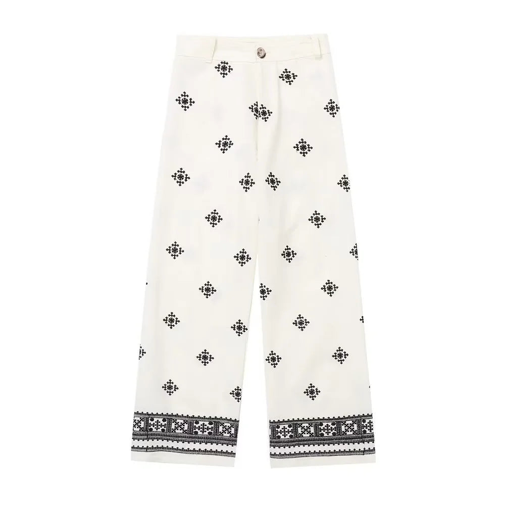 Pantalón retro ancho bordado con flores minimalistas