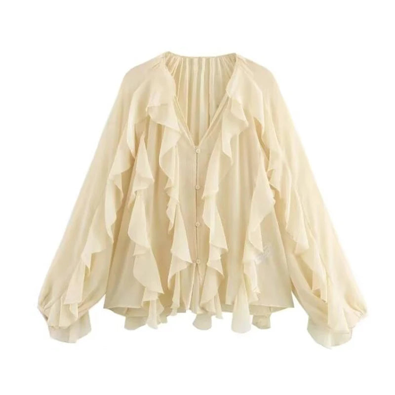 Blusa ligera con volantes manga larga