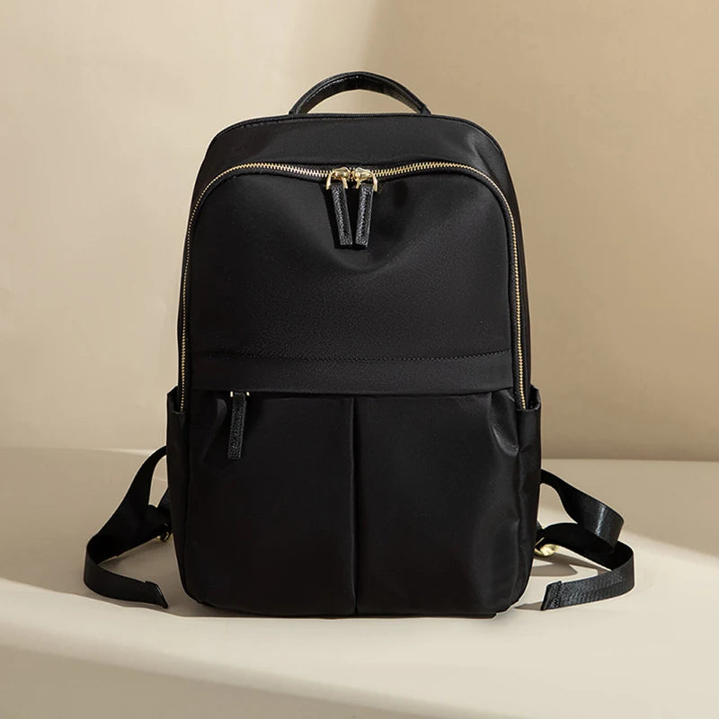 Mochila impermeable de tela oxford para laptop / Varios colores