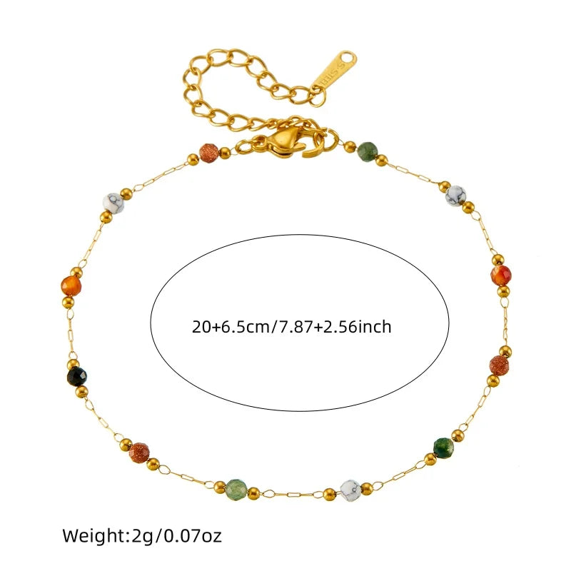 Pulsera delgada de acero inoxidable con cuentas de colores naturales