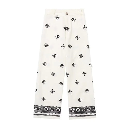 Pantalón retro ancho bordado con flores minimalistas