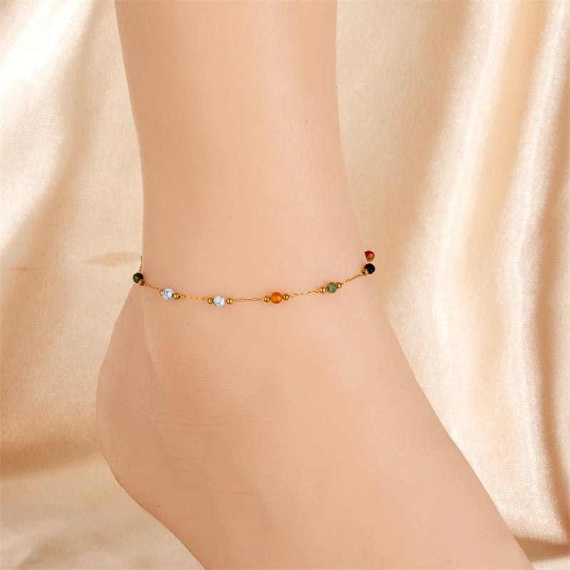 Pulsera delgada de acero inoxidable con cuentas de colores naturales